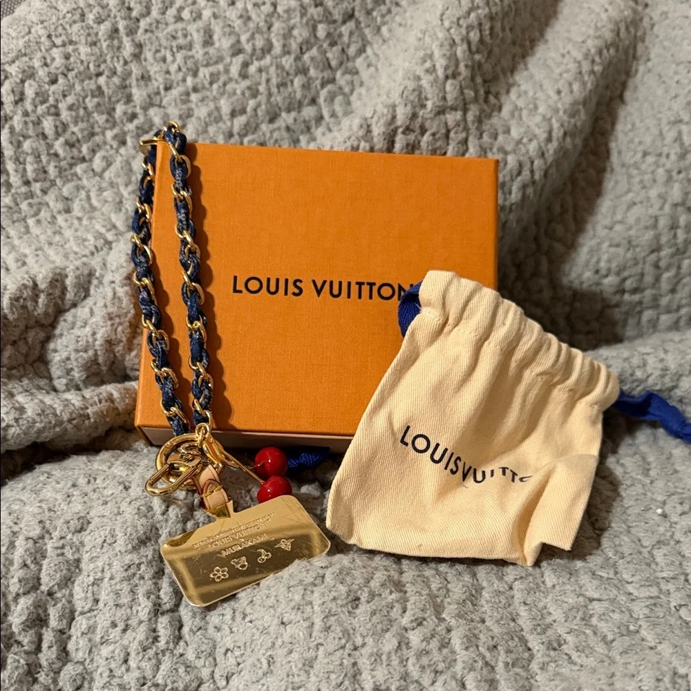 Louis Vuitton:  LV x TM Denim Cerise phone holder